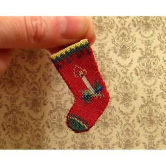 Dollhouse needlepoint Candle Christmas stocking being held
