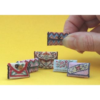 Dollhouse needlepoint clutch bags collection of all six