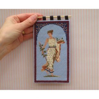 Dollhouse needlepoint wall hanging Grecian Lady being held